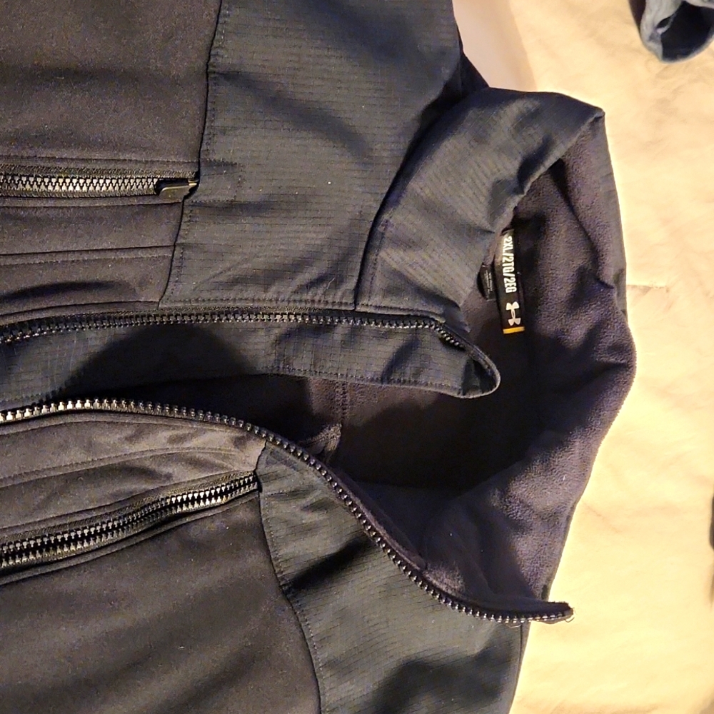 Mens 2x Under Armour black lightweight jacket with flag patch. Like new